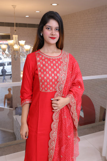 Red three piece suit